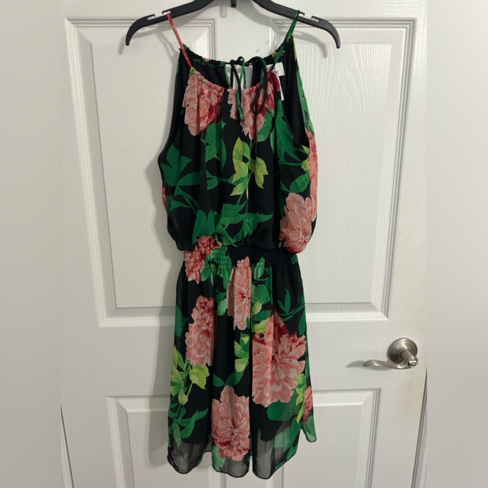 Midi black dress with pink flowers design and green leaves